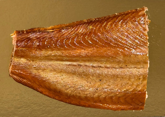 Small portion of hot oak smoked Scottish salmon